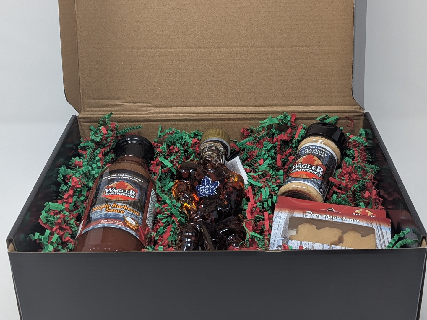 Holiday gift box with Wagler Maple Products maple syrup, bbq sauce, maple sugar, and maple sugar candy